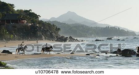 Tourists riding horses on the beach, Sayulita, Nayarit, Mexico View Large Photo Image Stock Photo - Tourists riding horses on the beach, Sayulita, Nayarit, Mexico. Fotosearch