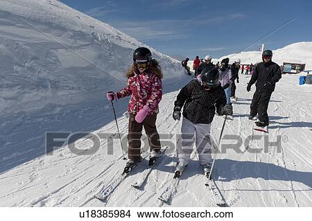 Picture - Tourists skiing, Whistler, British Columbia, Canada. Fotosearch