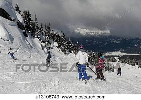 Tourists skiing, Whistler, British Columbia, Canada View Large Photo Image Stock Photo - Tourists skiing, Whistler, British Columbia, Canada. Fotosearch