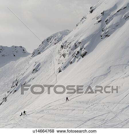 Stock Photo - Tourists skiing, Whistler, British Columbia, Canada. Fotosearch