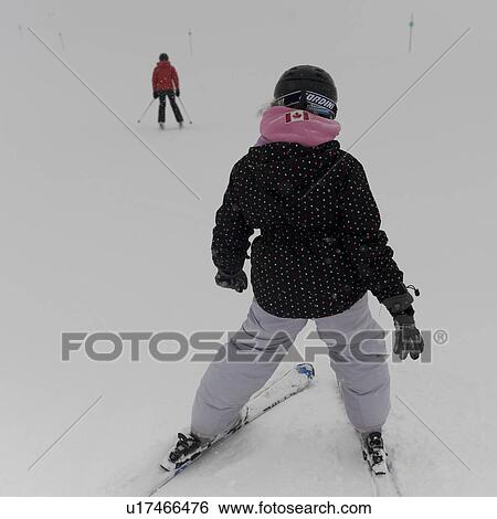 Tourists skiing, Whistler, British Columbia, Canada View Large Photo Image Stock Photograph - Tourists skiing, Whistler, British Columbia, Canada. Fotosearch