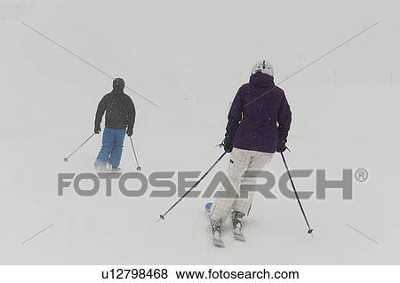 Stock Photo - Tourists skiing, Whistler Mountain, Whistler, British Columbia, Canada. Fotosearch