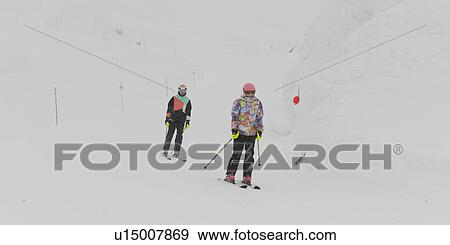 Stock Photo - Tourists skiing, Whistler Mountain, Whistler, British Columbia, Canada. Fotosearch