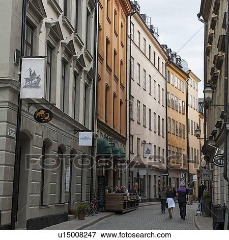 Tourists walking on a street, Gamla Stan, Stockholm, Sweden View Large Photo Image Stock Photo - Tourists walking on a street, Gamla Stan, Stockholm, Sweden. Fotosearch