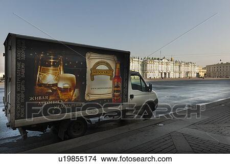 Picture - Truck on a street with Winter Palace and State Hermitage Museum in the background, Palace Square, St. Petersburg, Russia. Fotosearch