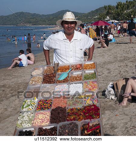 Vendor selling traditional Mexican snacks, Sayulita, Nayarit, Mexico View Large Photo Image Stock Image - Vendor selling traditional Mexican snacks, Sayulita, Nayarit, Mexico. Fotosearch