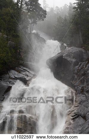 Stock Photo - Waterfall in a forest, Shannon Falls, Shannon Falls Provincial Park, British Columbia, Canada. Fotosearch
