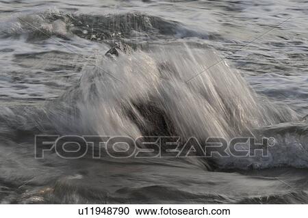 Waves breaking on rocks, Sayulita, Nayarit, Mexico View Large Photo Image Stock Image - Waves breaking on rocks, Sayulita, Nayarit, Mexico. Fotosearch