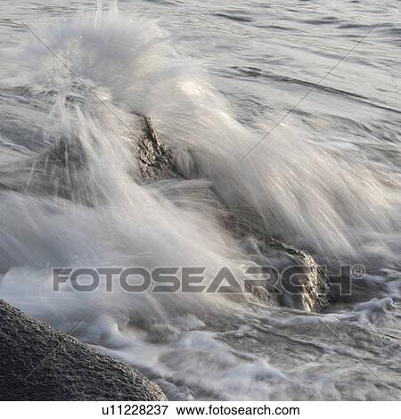 Stock Photo - Waves breaking on rocks, Sayulita, Nayarit, Mexico. Fotosearch
