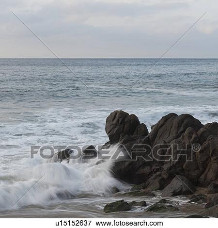 Stock Photo - Waves breaking on rocks, Sayulita, Nayarit, Mexico. Fotosearch