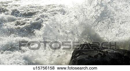 Stock Photo - Waves breaking on rocks, Sayulita, Nayarit, Mexico. Fotosearch