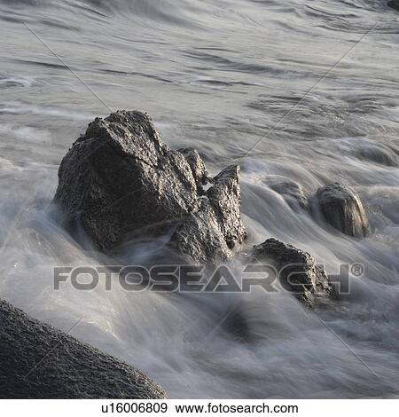 Waves breaking on rocks, Sayulita, Nayarit, Mexico View Large Photo Image Stock Photo - Waves breaking on rocks, Sayulita, Nayarit, Mexico. Fotosearch