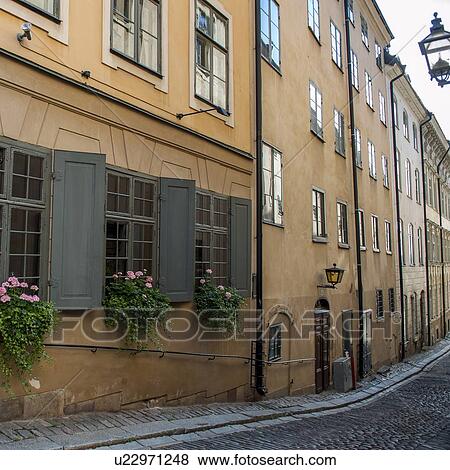 Window boxes on the windows of building, Gamla Stan, Stockholm, Sweden View Large Photo Image Stock Photo - Window boxes on the windows of building, Gamla Stan, Stockholm, Sweden. Fotosearch