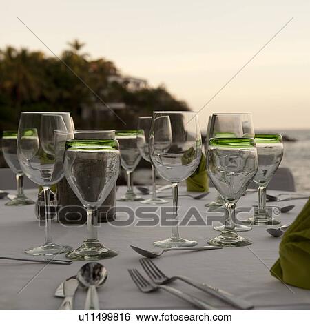 Wine glasses on a table, Sayulita, Nayarit, Mexico View Large Photo Image Stock Photograph - Wine glasses on a table, Sayulita, Nayarit, Mexico. Fotosearch