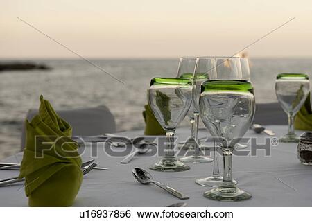 Wine glasses on a table, Sayulita, Nayarit, Mexico View Large Photo Image Stock Photograph - Wine glasses on a table, Sayulita, Nayarit, Mexico. Fotosearch