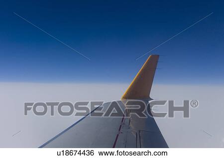 Wing of an airplane of Air Canada View Large Photo Image Stock Photograph - Wing of an airplane of Air Canada. Fotosearch