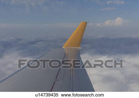 Wing of an airplane of Air Canada View Large Photo Image Stock Photography - Wing of an airplane of Air Canada. Fotosearch