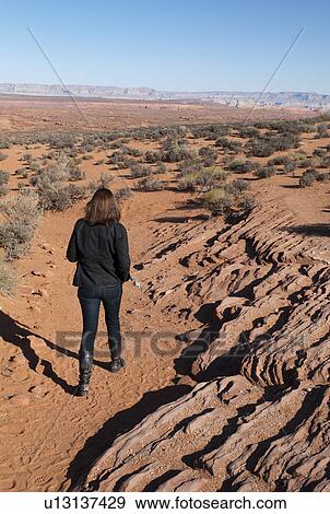 Woman walking in a desert, Horseshoe Bend, Glen Canyon National Recreation Area, Arizona-Utah, USA View Large Photo Image Stock Photo - Woman walking in a desert, Horseshoe Bend, Glen Canyon National Recreation Area, Arizona-Utah, USA. Fotosearch