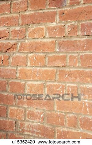 Close-up of reddish-brown brick wall View Large Photo Image Stock Image - Close-up of reddish-brown brick wall. Fotosearch
