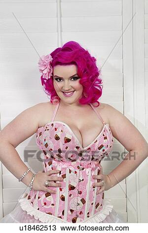 Portrait of a happy woman posing View Large Photo Image Stock Image - Portrait of a happy woman posing. Fotosearch