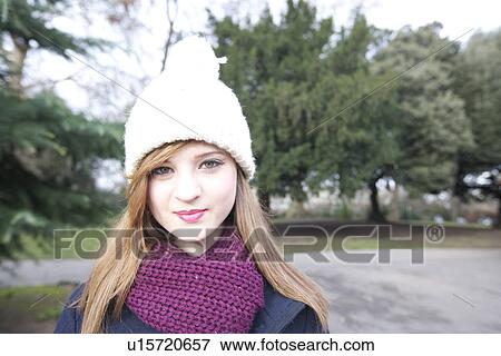 Portrait of a young woman smiling View Large Photo Image Stock Photo - Portrait of a young woman smiling. Fotosearch