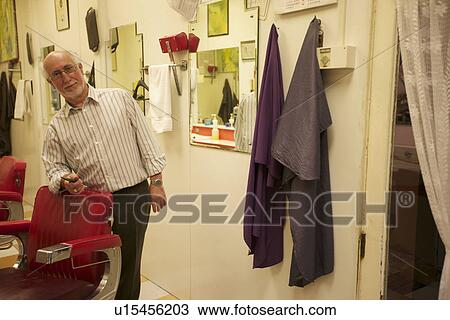Portrait of senior barber in shop View Large Photo Image Stock Image - Portrait of senior barber in shop. Fotosearch