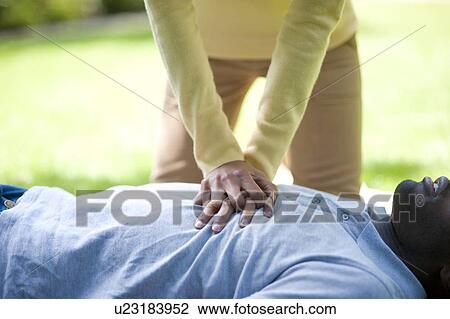 Adult cardiopulmonary resuscitation (CPR). View Large Photo Image Stock Image - Adult cardiopulmonary resuscitation (CPR).. Fotosearch