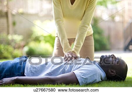Adult cardiopulmonary resuscitation (CPR). View Large Photo Image Stock Image - Adult cardiopulmonary resuscitation (CPR).. Fotosearch