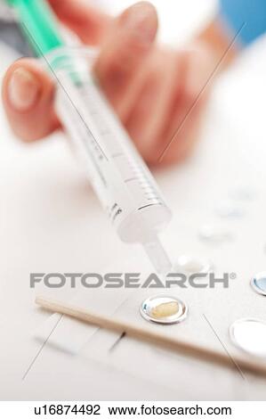 Stock Image - Allergy patch test preparation.. Fotosearch