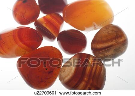 Assortment of various red Gemstones including brecciated jasper and Carnelian View Large Photo Image Stock Image - Assortment of various red Gemstones including brecciated jasper and Carnelian. Fotosearch