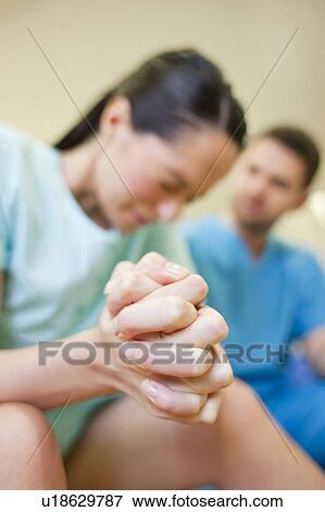 Stock Photo - Birthing centre. Pregnant woman during early labour at a birthing centre.. Fotosearch