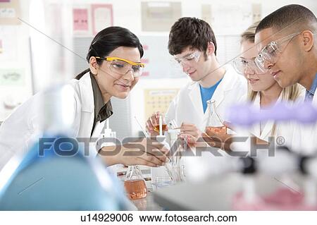 Chemistry lesson. View Large Photo Image Stock Photograph - Chemistry lesson.. Fotosearch