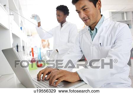 Stock Photo - Chemists.. Fotosearch