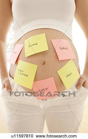 Choosing baby names. View Large Photo Image Stock Image - Choosing baby names.. Fotosearch