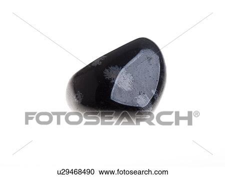 Stock Image - Cutout of a snowflake obsidian gemstone on black background. Fotosearch