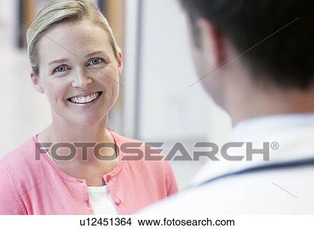 Picture - Doctor and patient.. Fotosearch