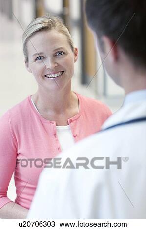 Stock Image - Doctor and patient.. Fotosearch