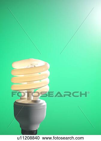 Energy-saving light bulb. View Large Photo Image Stock Image - Energy-saving light bulb.. Fotosearch