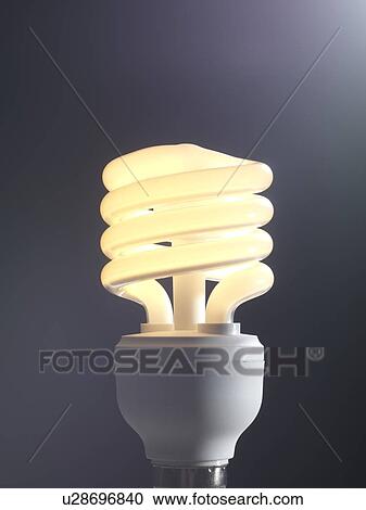 Energy-saving light bulb. View Large Photo Image Stock Image - Energy-saving light bulb.. Fotosearch