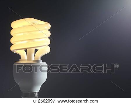 Energy-saving light bulb. View Large Photo Image Stock Photo - Energy-saving light bulb.. Fotosearch
