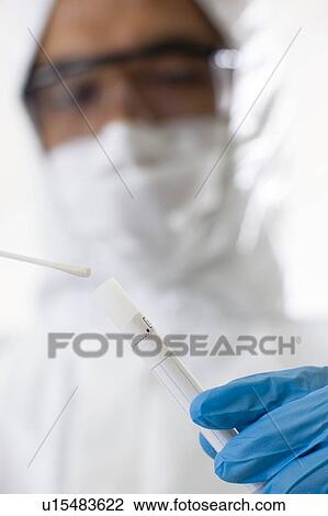 Stock Image - Forensic scientist.. Fotosearch