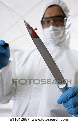 Stock Photo - Forensic scientist.. Fotosearch