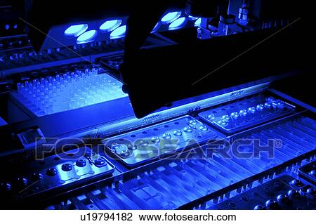 Stock Image - Genome sequencing machine. 96-channel size selection robot for genomic library construction for next-generation sequencing. Photographed at the Genome Sciences Center, Vancouver, Canada.. Fotosearch