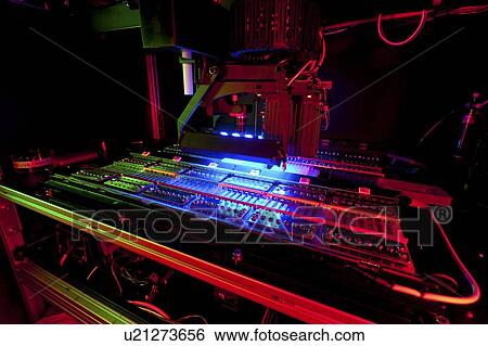 Stock Photograph - Genome sequencing machine. 96-channel size selection robot for genomic library construction for next-generation sequencing. Photographed at the Genome Sciences Center, Vancouver, Canada.. Fotosearch
