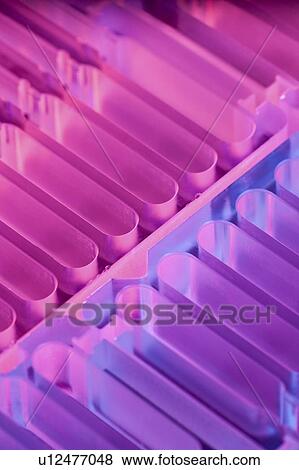 Stock Photo - Genome sequencing machine. Close-up of electrophoresis gel channels in a machine for automated size selection of genome fragments for sequencing. Photographed at the Genome Sciences Center, Vancouver, Canada.. Fotosearch