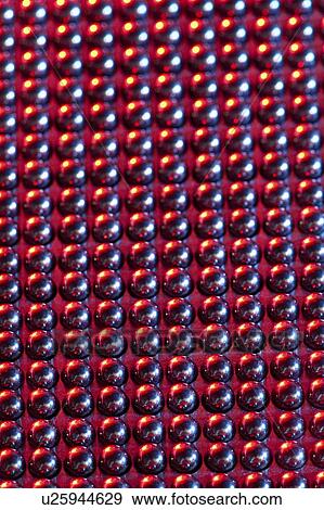 Stock Photo - Genome sequencing machine. Close-up of magnetic spheres used in genome sequencing. Photographed at the Genome Sciences Center, Vancouver, Canada.. Fotosearch