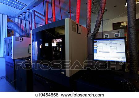Stock Photograph - Genome sequencing machine. High-throughput next-generation genome sequencing machine. This is a SOLiD 4 machine, produced by Applied Biosystems. Photographed at the Genome Sciences Center, Vancouver, Canada.. Fotosearch