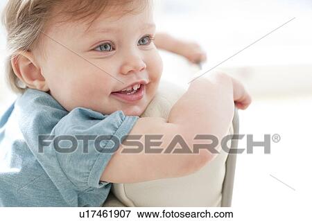 Stock Photo - Happy toddler. Smiling 15 month old girl.. Fotosearch