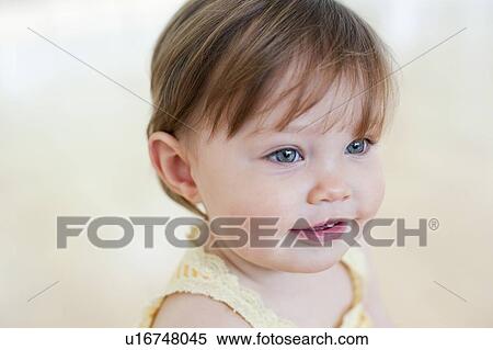 Happy toddler. Smiling 15 month old girl. View Large Photo Image Stock Photography - Happy toddler. Smiling 15 month old girl.. Fotosearch