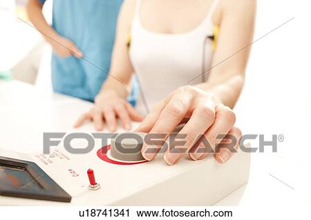 Iontophoresis. This is a treatment for excess sweating. View Large Photo Image Stock Image - Iontophoresis. This is a treatment for excess sweating.. Fotosearch